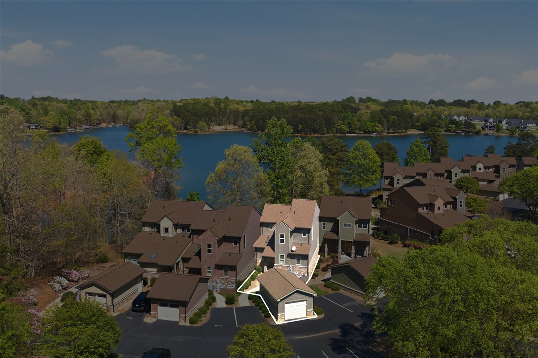 578 Sunset Point Drive West Union, SC 29696 - Photo 44 of 46 Perched by the water, this multi-level home offers scenic views and a harmonious blend with nature.