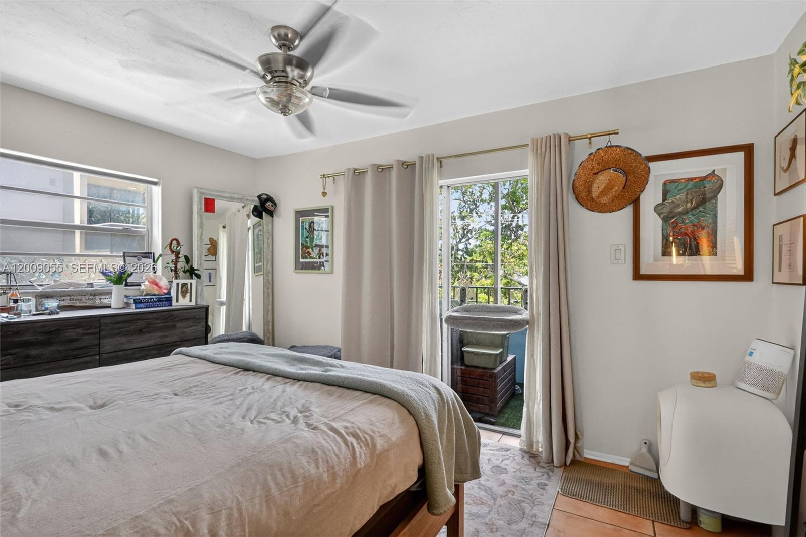 3304 Virginia Street, Unit 3D Miami, FL 33133 - Photo 16 of 19 a bedroom with a bed and a window