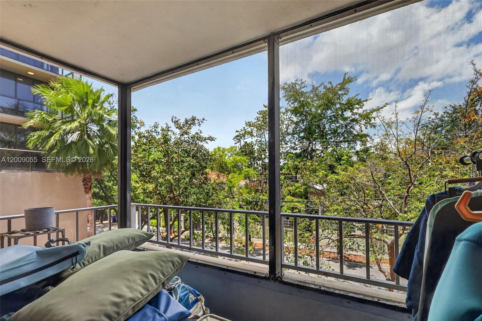 3304 Virginia Street, Unit 3D Miami, FL 33133 - Photo 10 of 19 a balcony with furniture and a potted plant