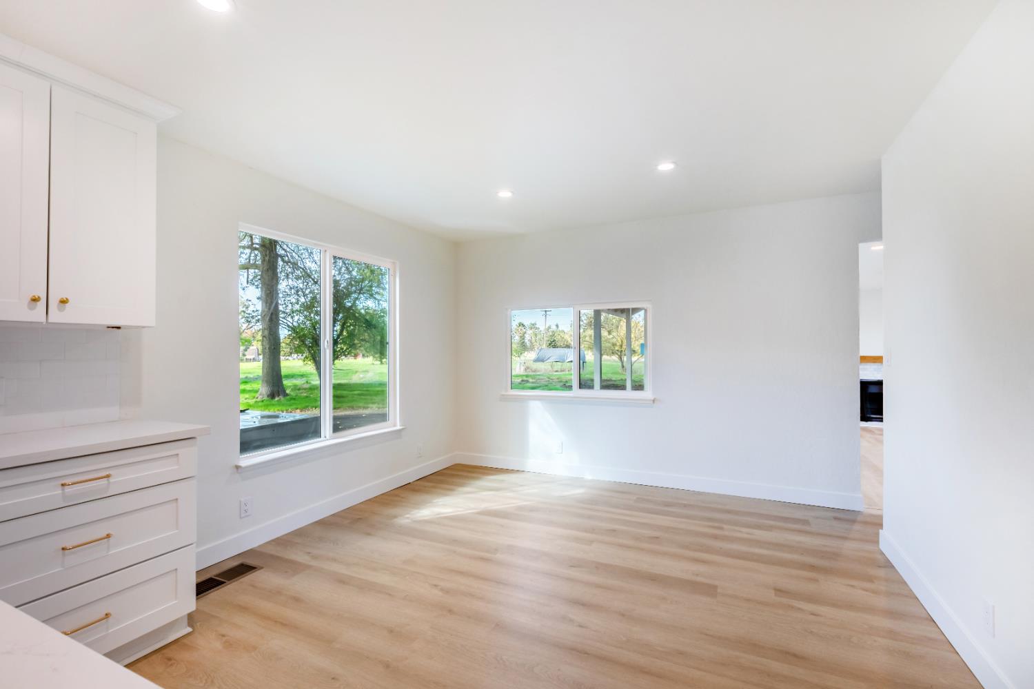 10020 Alta Mesa Road Wilton, CA 95693 - Photo 23 of 56 wooden floor in an empty room with a window