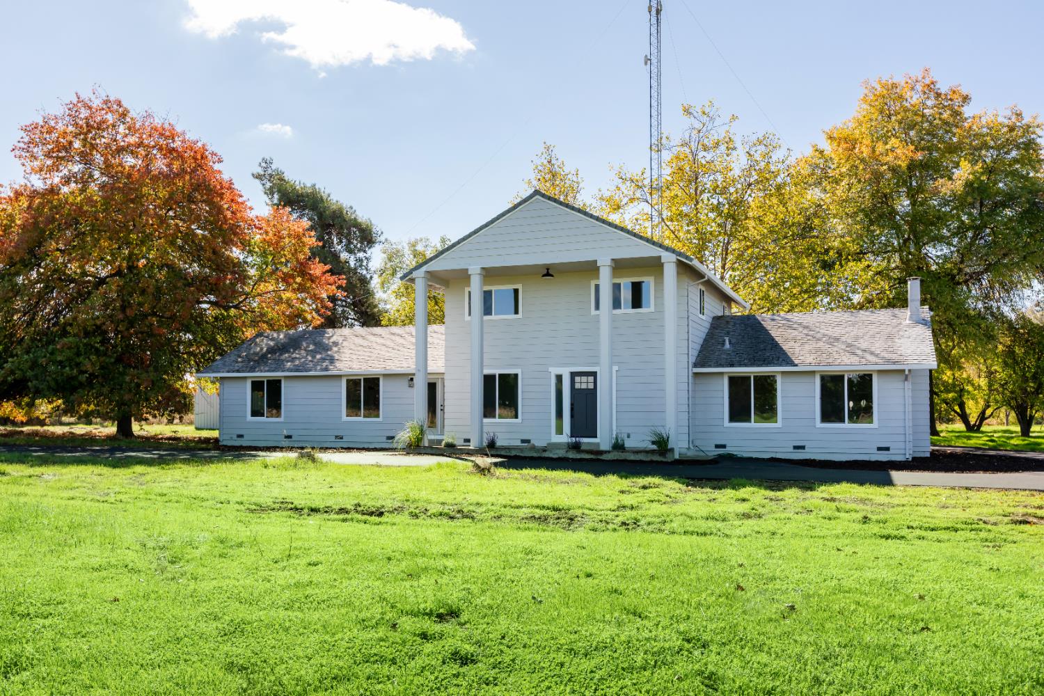 10020 Alta Mesa Road Wilton, CA 95693 - Photo 3 of 56 a front view of house with yard and green space