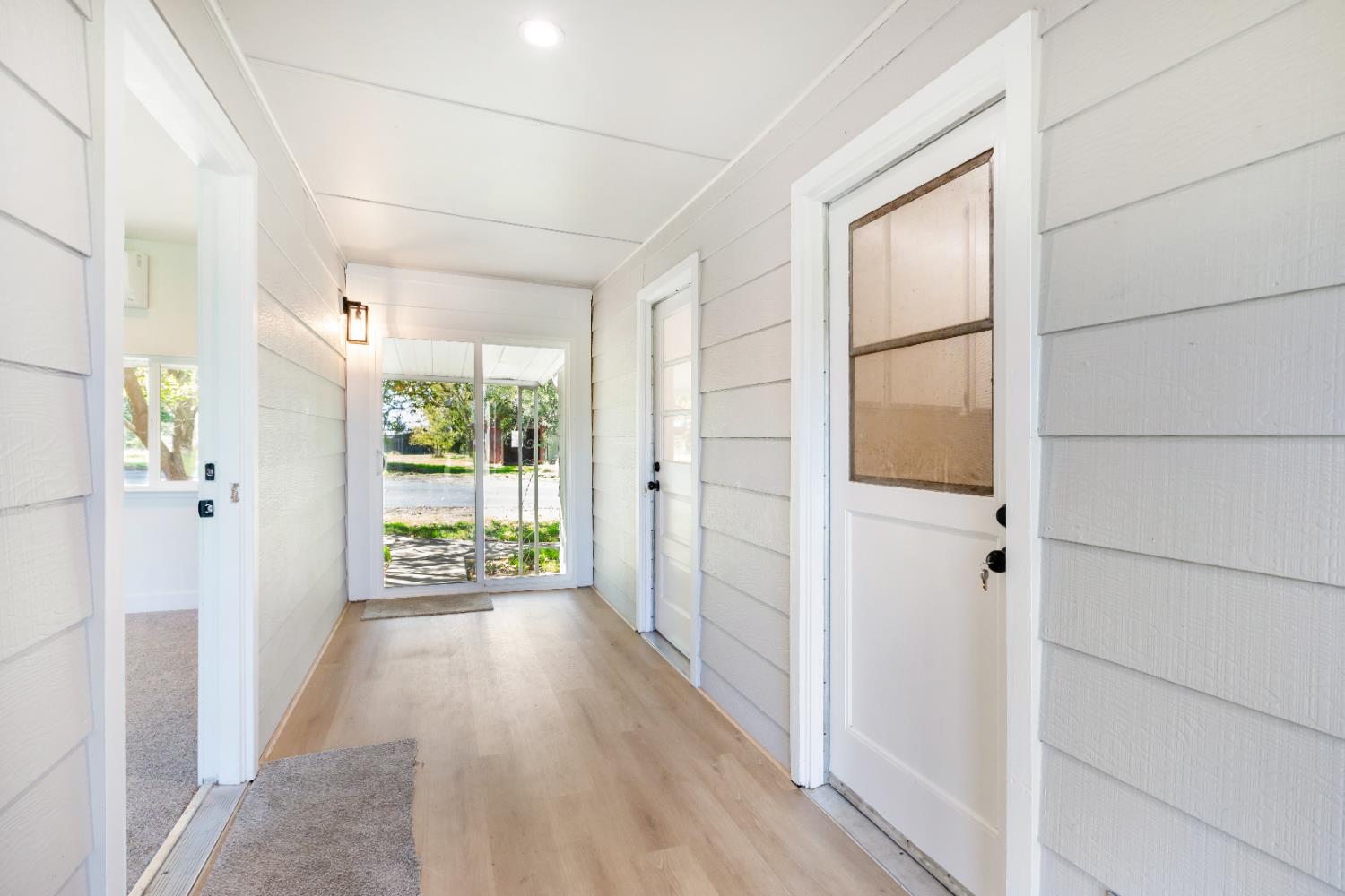 10020 Alta Mesa Road Wilton, CA 95693 - Photo 32 of 56 a view of hallway with wooden floor