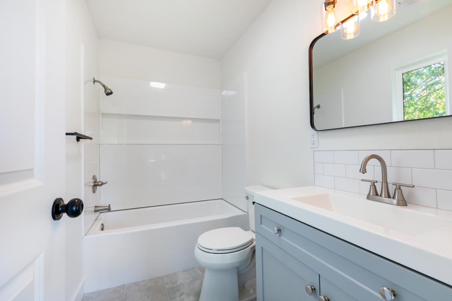 10020 Alta Mesa Road Wilton, CA 95693 - Photo 36 of 56 a bathroom with a sink a toilet and shower