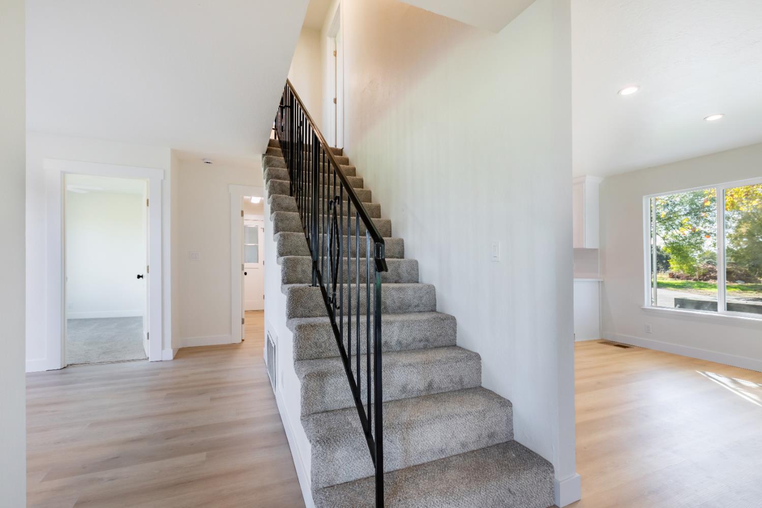 10020 Alta Mesa Road Wilton, CA 95693 - Photo 41 of 56 a view of entryway and hall with wooden floor