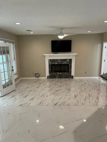 a view of a livingroom with a fireplace