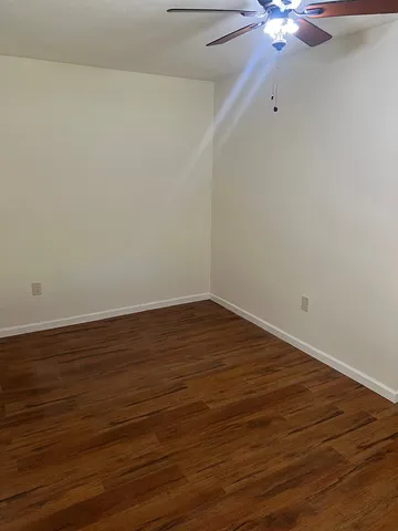 a bathroom with a toilet and shower