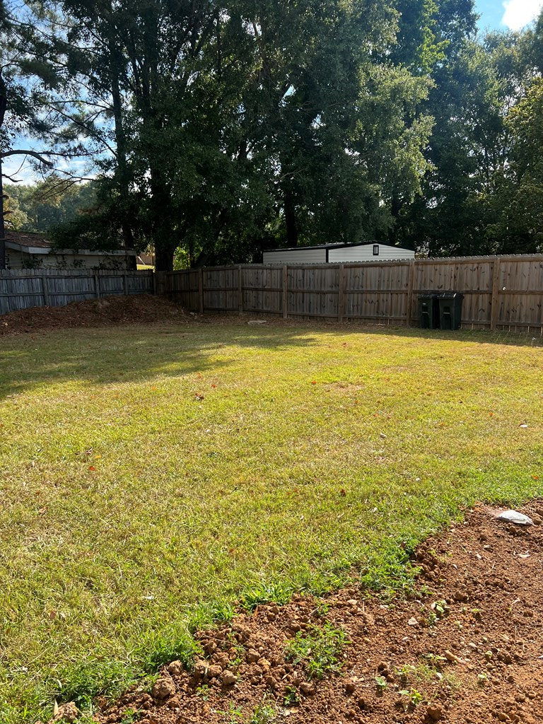 6528 Yellow Stone Court Columbus, GA 31909 - Photo 25 of 29 a view of a swimming pool and a yard