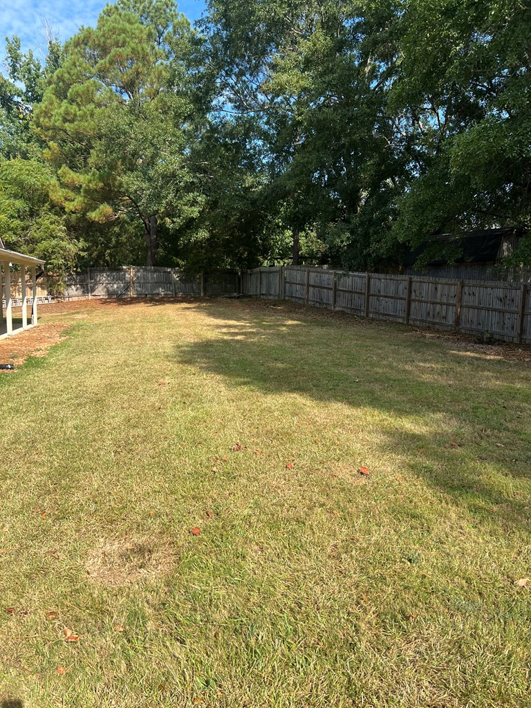 6528 Yellow Stone Court Columbus, GA 31909 - Photo 28 of 29 a view of a swimming pool with an outdoor space and seating area