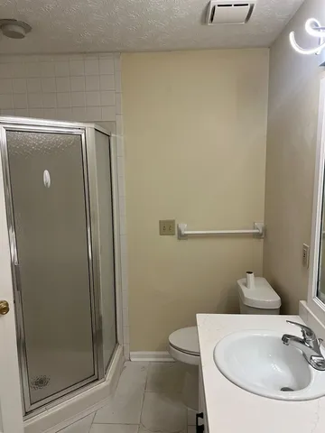 a bathroom with a sink and toilet