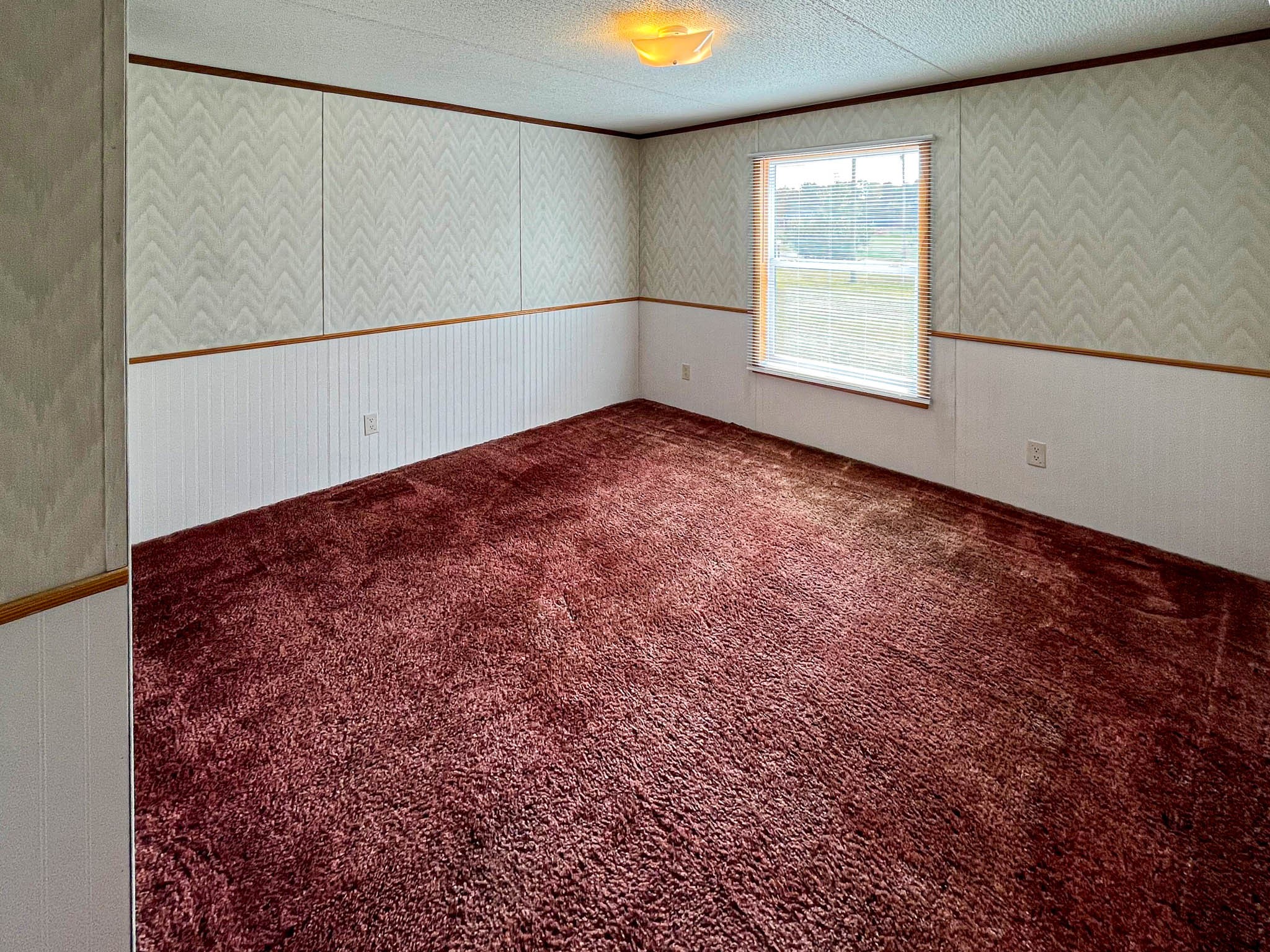 552 Rackley Road Goodspring, TN 38460 - Photo 14 of 26 an empty room with a window