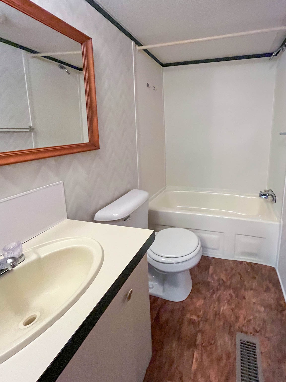 552 Rackley Road Goodspring, TN 38460 - Photo 16 of 26 a bathroom with a sink a toilet and shower