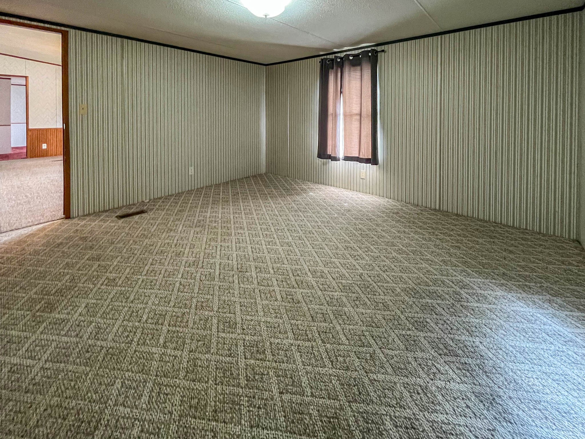 552 Rackley Road Goodspring, TN 38460 - Photo 19 of 26 a view of an empty room with a window