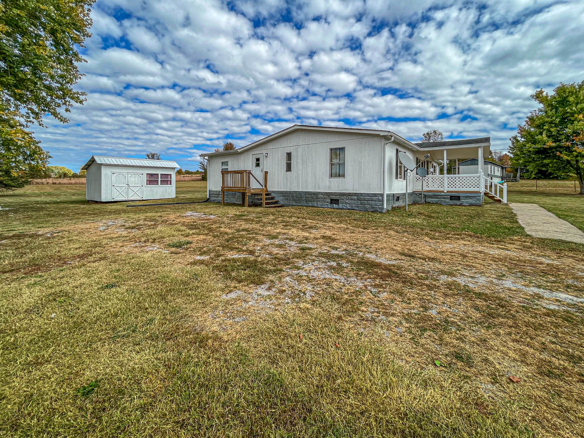 552 Rackley Road Goodspring, TN 38460 - Photo 5 of 26 a house with trees in the background