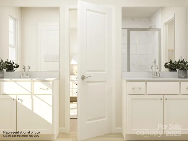 a white toilet sitting next to a bathroom sink