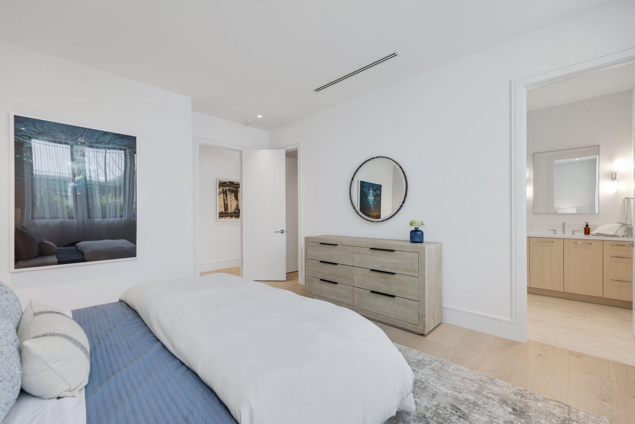 340 Grove Place Delray Beach, FL 33444 - Photo 62 of 95 a bedroom with a bed and a dresser