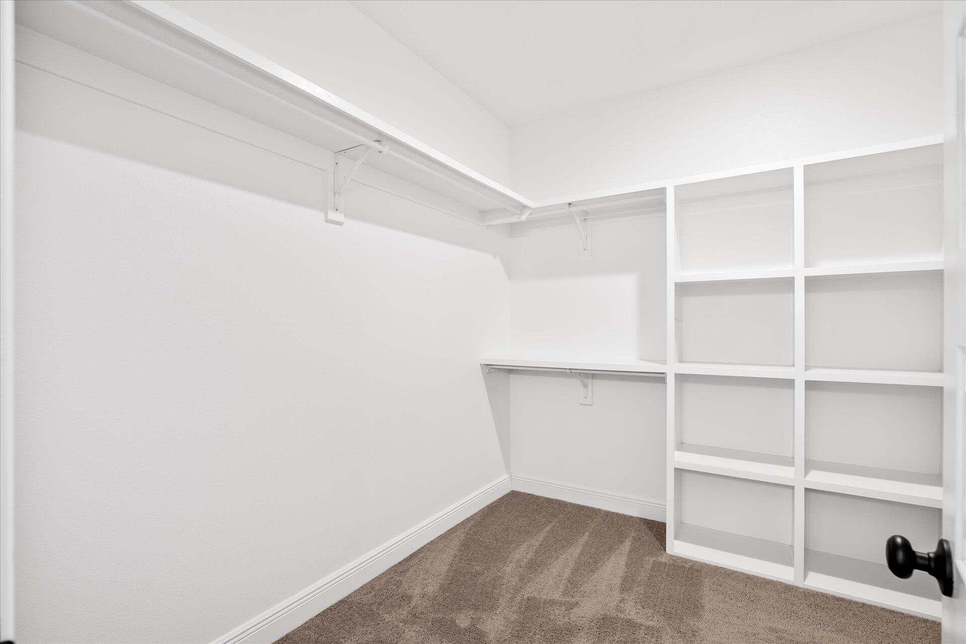 8934 Skip Stone Road Milton, FL 32583 - Photo 32 of 55 a view of an empty walk in closet