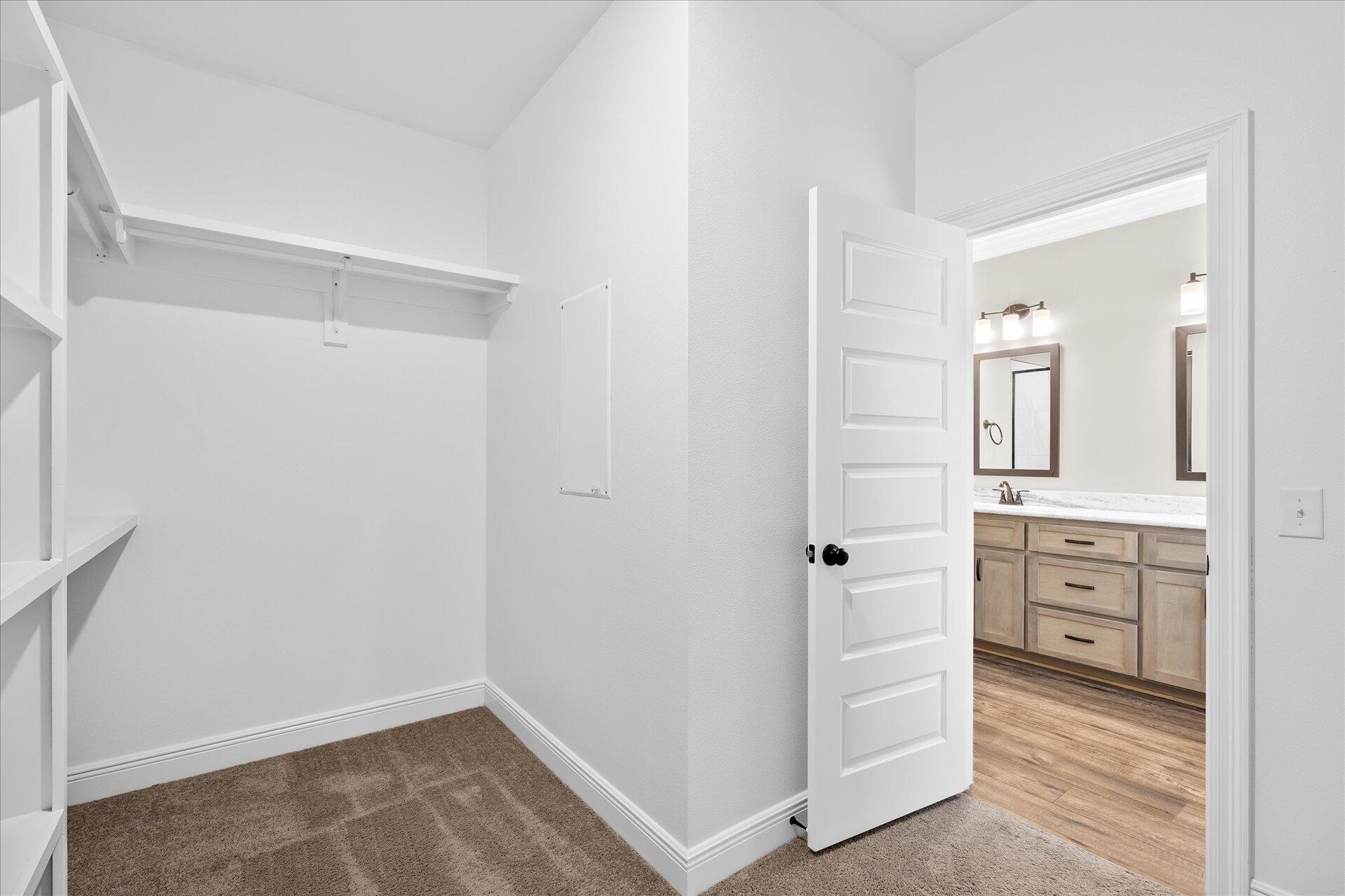 8934 Skip Stone Road Milton, FL 32583 - Photo 33 of 55 wooden floor with white cabinets