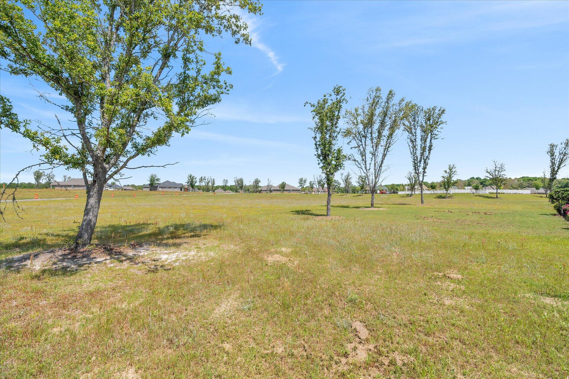 8934 Skip Stone Road Milton, FL 32583 - Photo 47 of 55 a view of an ocean with a nearby beach