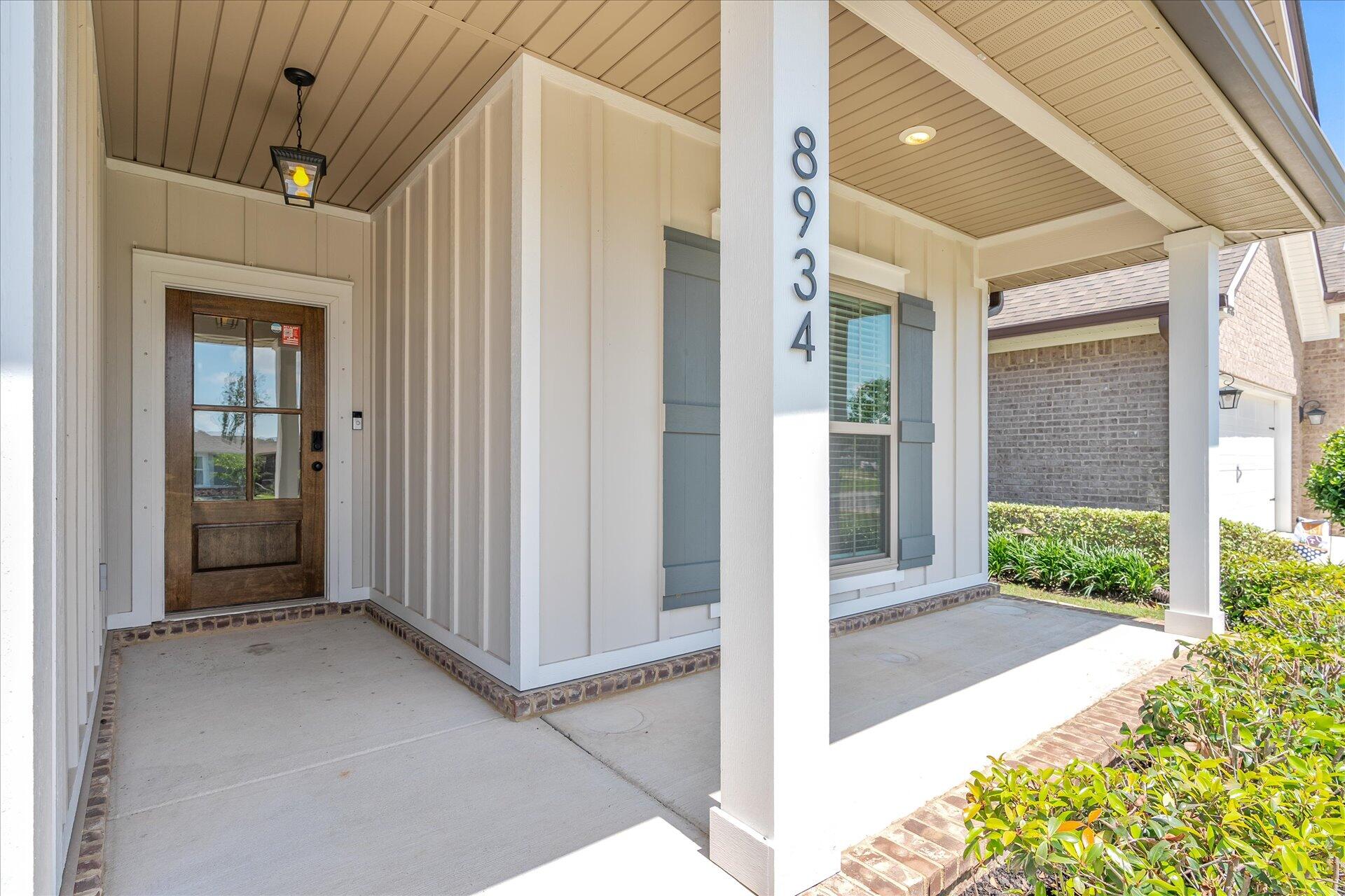 8934 Skip Stone Road Milton, FL 32583 - Photo 5 of 55 a view of a porch