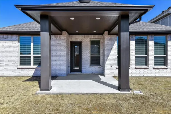 a front view of a house with a porch