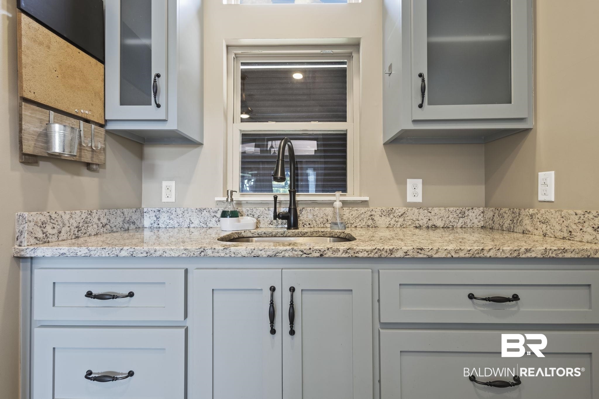 212 Magnifico Drive Foley, AL 36535 - Photo 27 of 50 Interior space featuring light stone counters and sink