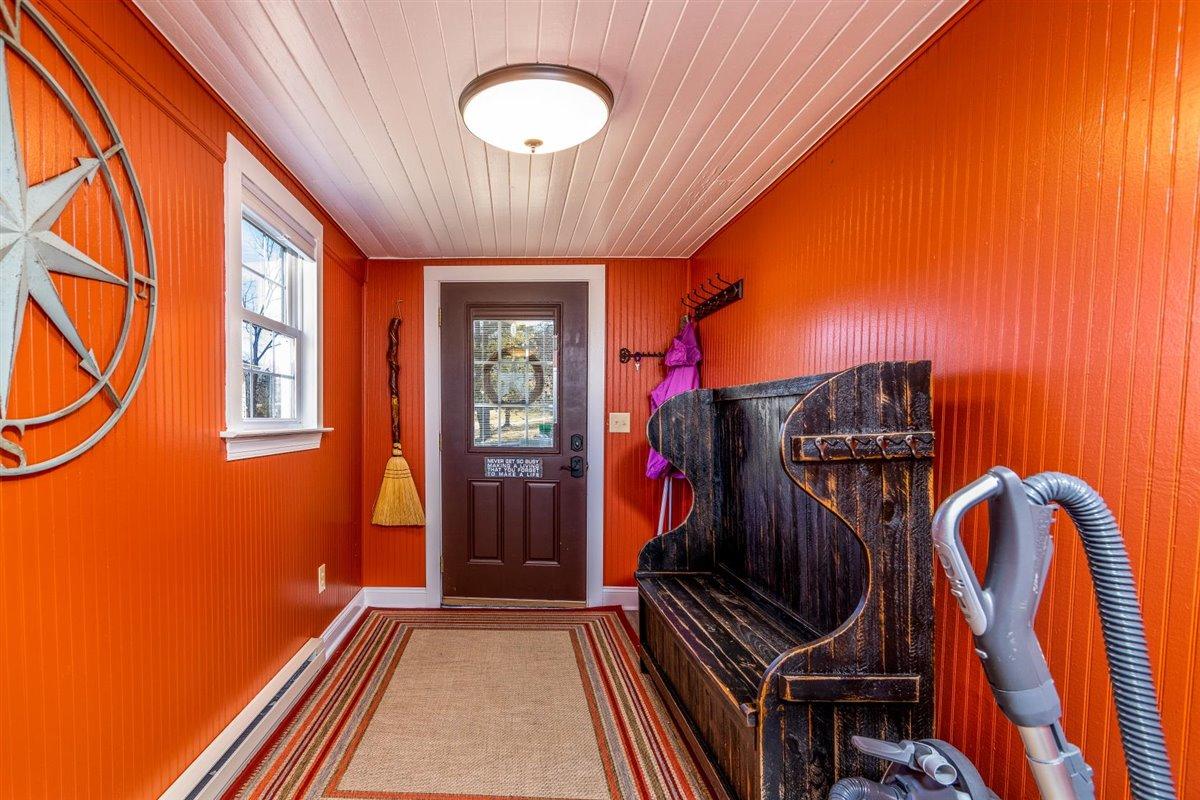 2717 Thompson Ridge Road Ferrum, VA 24088 - Photo 16 of 25 a view of an entryway with wooden floor