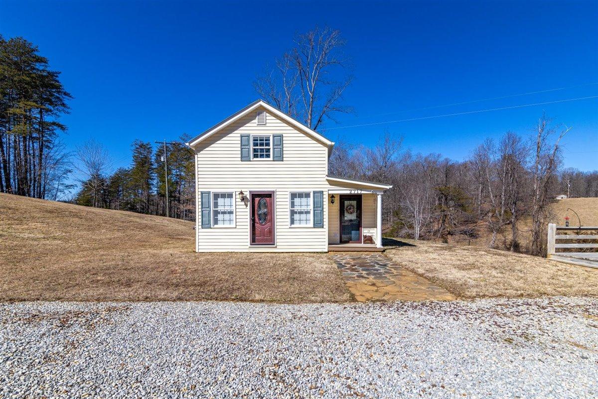 2717 Thompson Ridge Road Ferrum, VA 24088 - Photo 25 of 25 a view of a house with a yard