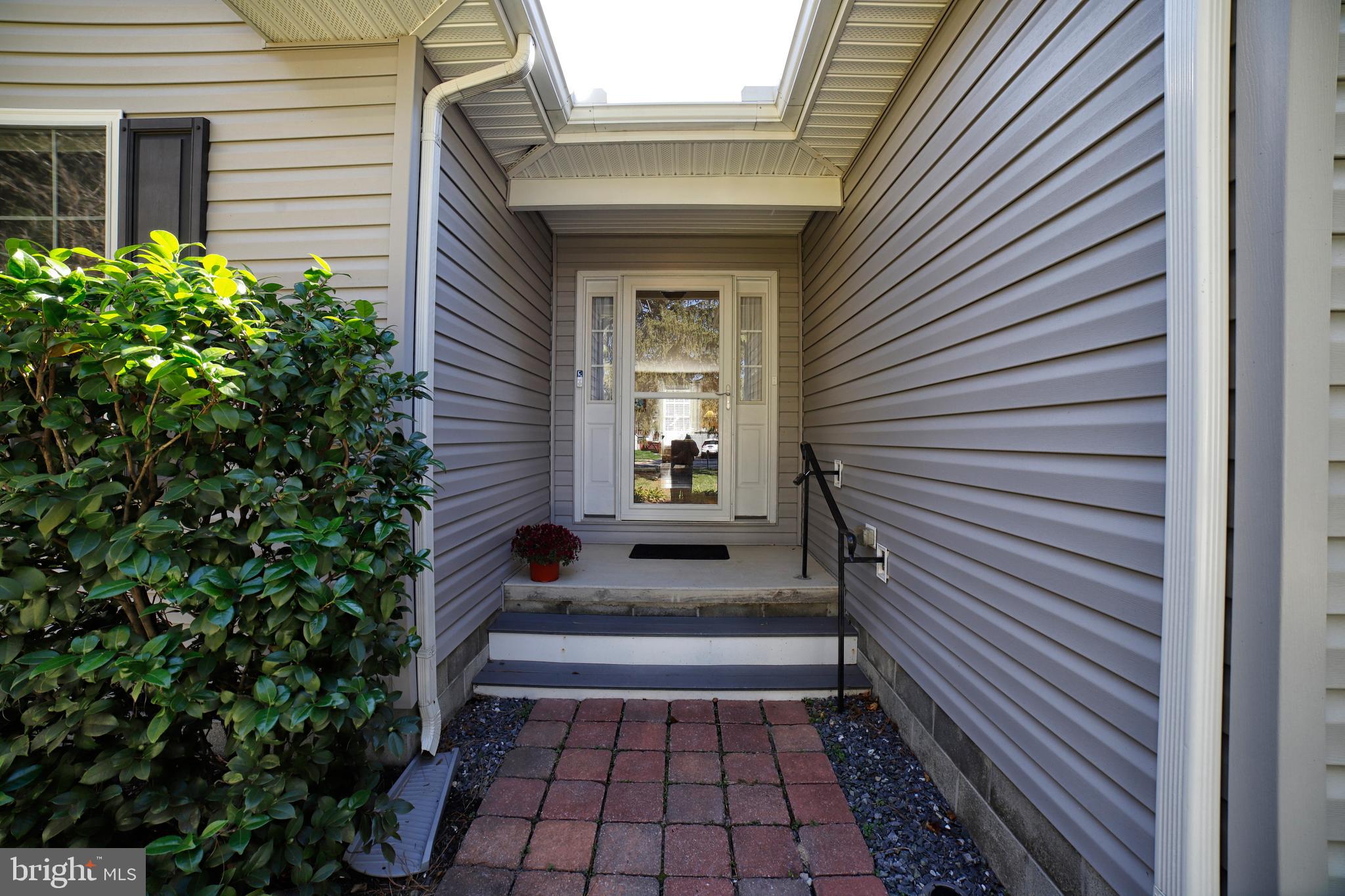 130 Walnut Street Ridgely, MD 21660 - Photo 2 of 27 a view of a house with a white door