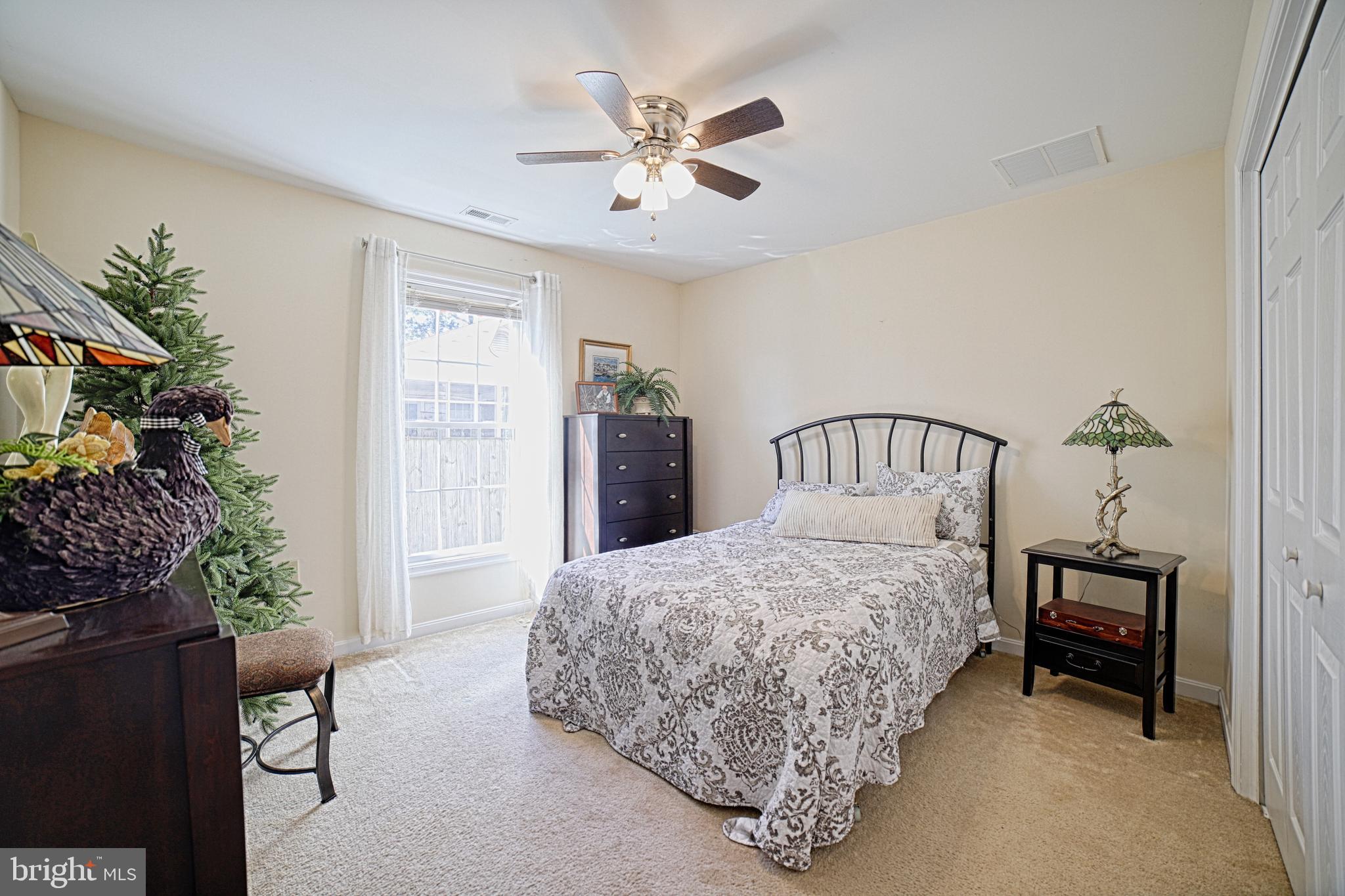 130 Walnut Street Ridgely, MD 21660 - Photo 26 of 27 a bedroom with a bed dresser and a window