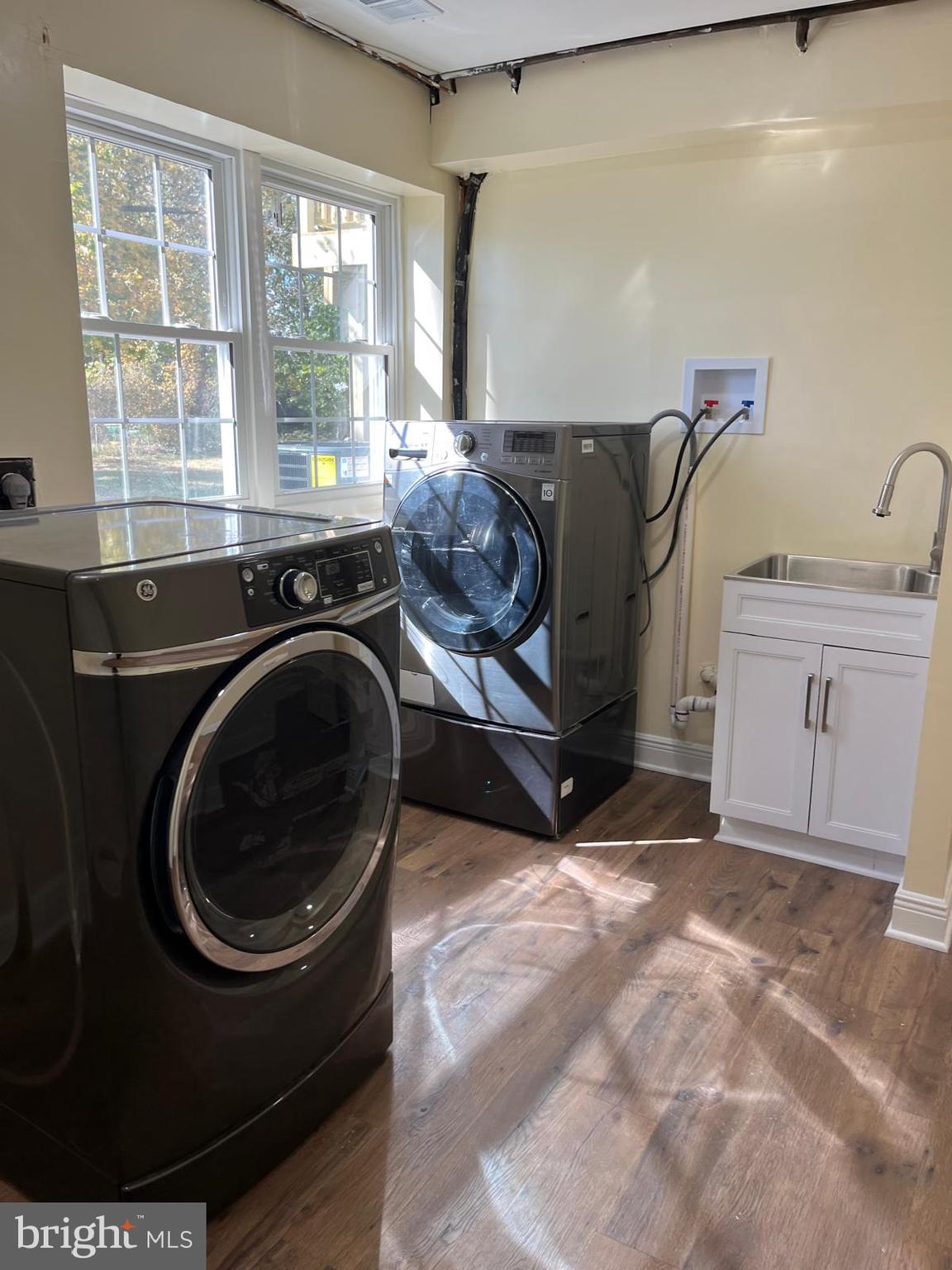 6706 Surratts Road Clinton, MD 20735 - Photo 13 of 24 a room with window dryer and washer