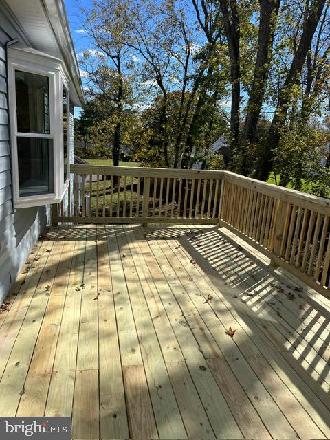 6706 Surratts Road Clinton, MD 20735 - Photo 17 of 24 a view of balcony with wooden floor