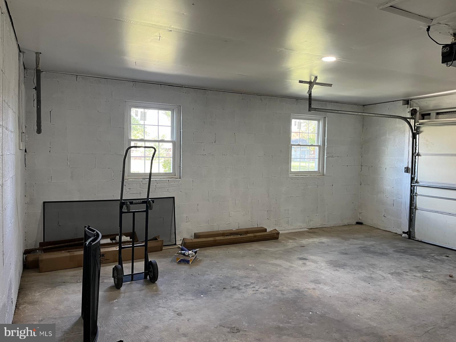 6706 Surratts Road Clinton, MD 20735 - Photo 21 of 24 a view of a room with gym equipment and windows