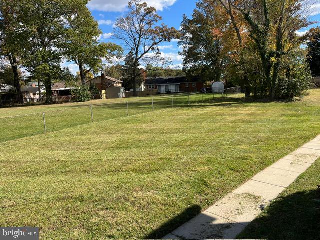 6706 Surratts Road Clinton, MD 20735 - Photo 23 of 24 a view of swimming pool with an outdoor space