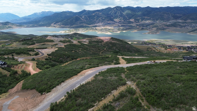 1845 East Outlaw Road, Unit 352 Hideout, UT 84036 - Photo 2 of 9 Expansive landscape featuring distant mountains, a large body of water, and surrounding greenery
