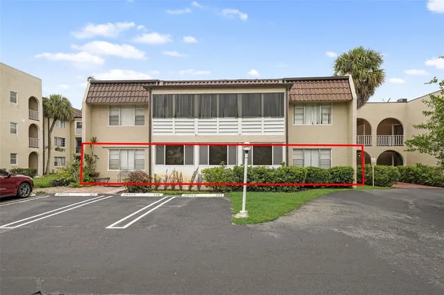 a front view of a house with and yard