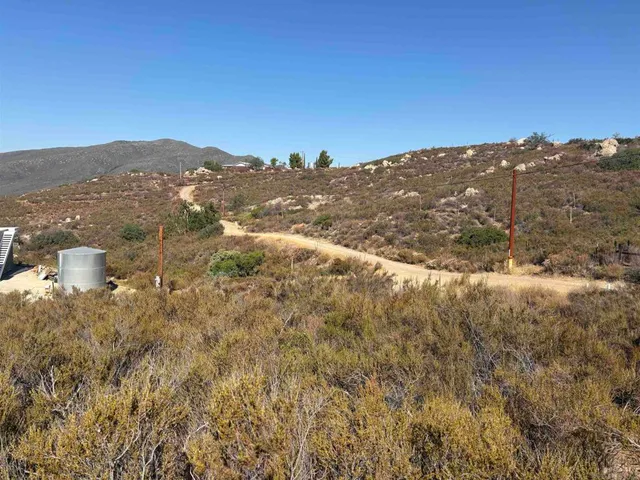 a view of mountain view with mountains in the background