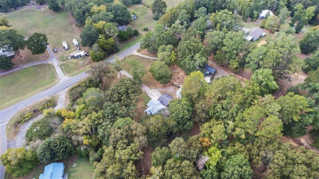 2557 Wax Road Southeast Aragon, GA 30104 - Photo 17 of 18 an aerial view of a house with a yard and lake view