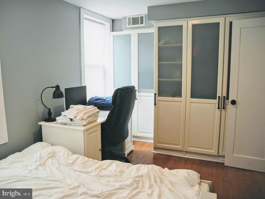 1933 Rodman Street Philadelphia, PA 19146 - Photo 12 of 21 a bedroom with a bed and a chair