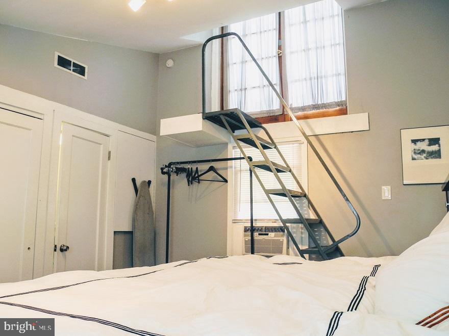 1933 Rodman Street Philadelphia, PA 19146 - Photo 15 of 21 a room with a bed and a window