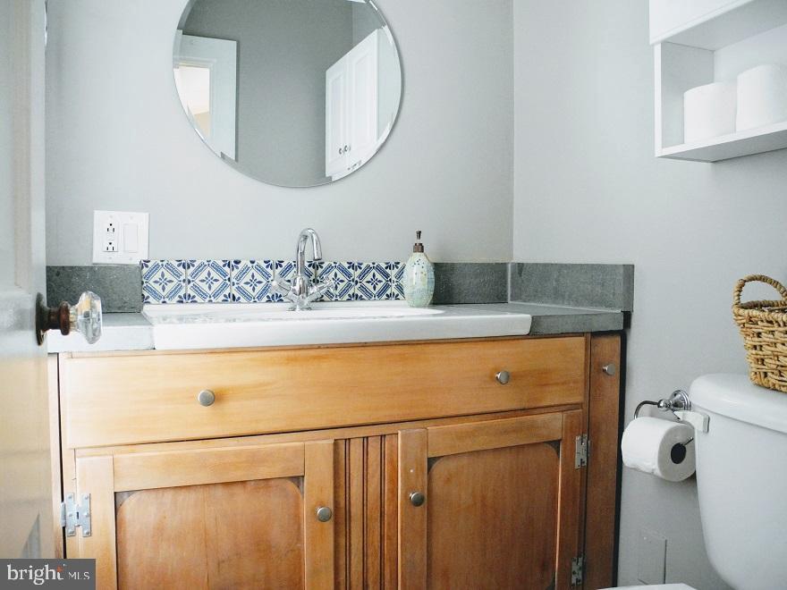 1933 Rodman Street Philadelphia, PA 19146 - Photo 17 of 21 a bathroom with a sink and a mirror