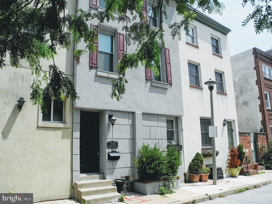 1933 Rodman Street Philadelphia, PA 19146 - Photo 21 of 21 a front view of a building with street view