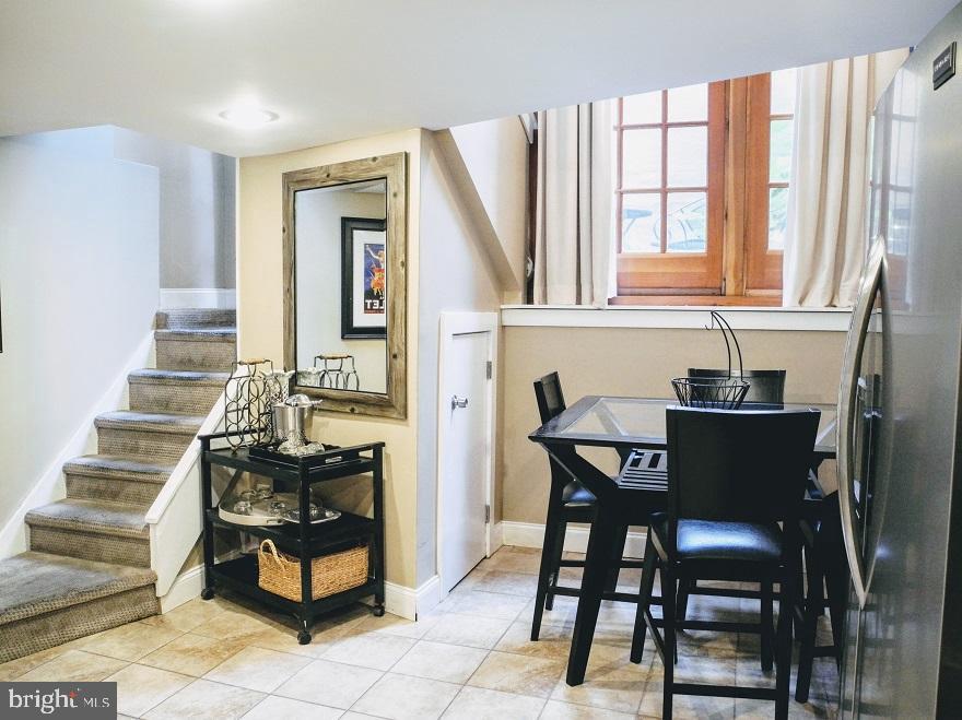 1933 Rodman Street Philadelphia, PA 19146 - Photo 4 of 21 a view of a dining room with furniture and window