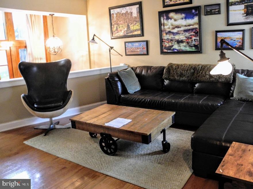 1933 Rodman Street Philadelphia, PA 19146 - Photo 5 of 21 a living room with furniture rug and window