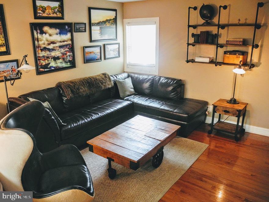 1933 Rodman Street Philadelphia, PA 19146 - Photo 6 of 21 a living room with furniture and a rug