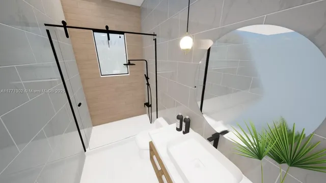 a bathroom with a double vanity sink toilet and shower