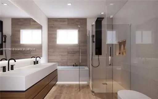 a bedroom with a bed and a mirror