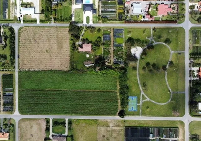 a black white house with a large window