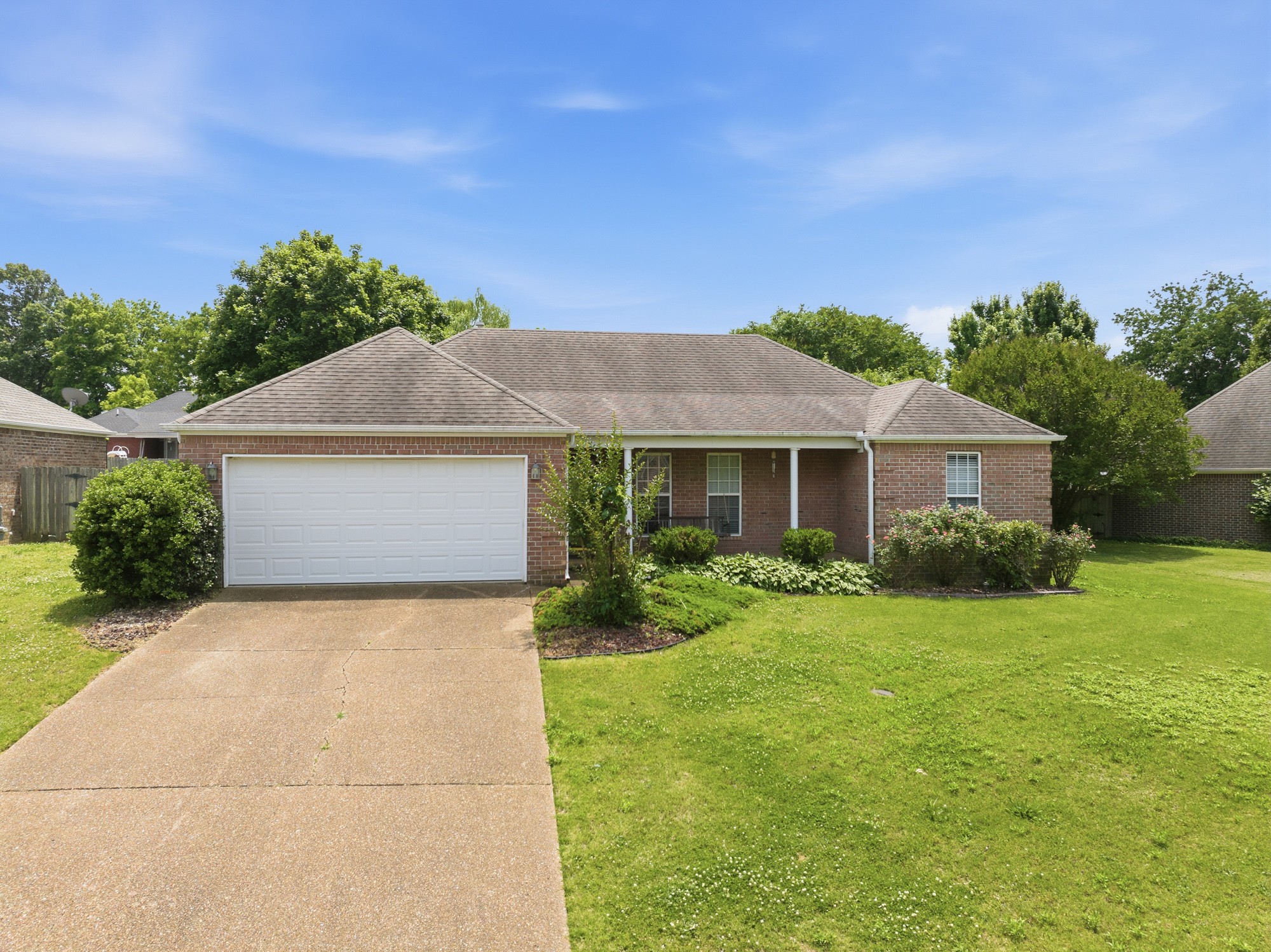 270 Reed Circle Medina, TN 38355 - Photo 4 of 30 a front view of a house with garden