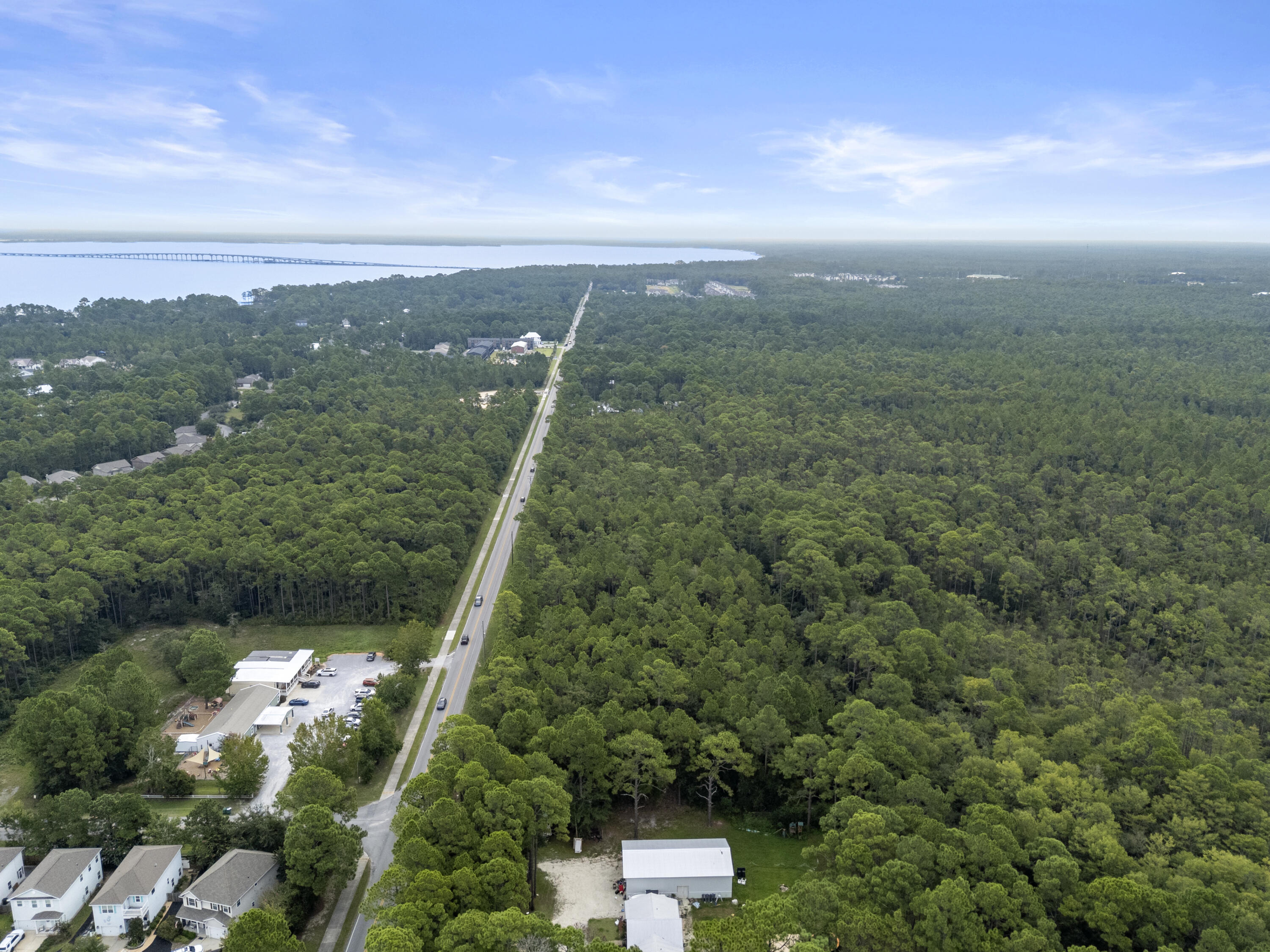 Abc Abc Chat Holley Road Santa Rosa Beach, FL 32459 - Photo 9 of 14 a view of a city from a yard