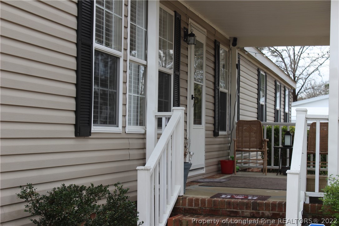 6520 Faircloth Bridge Road Stedman, NC 28391 - Photo 3 of 39 a view of a entrance of the house